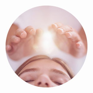 Reiki hand positions above a recipient’s head, illustrating Reiki Level 1 Practice