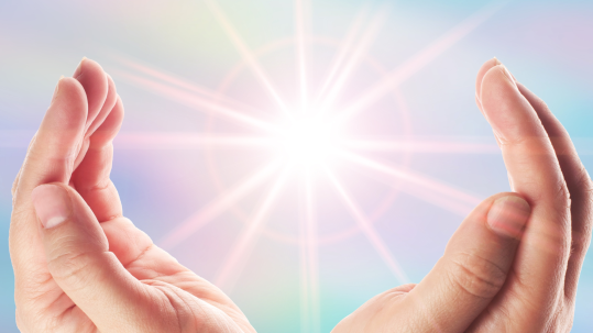 Hands with Reiki energy